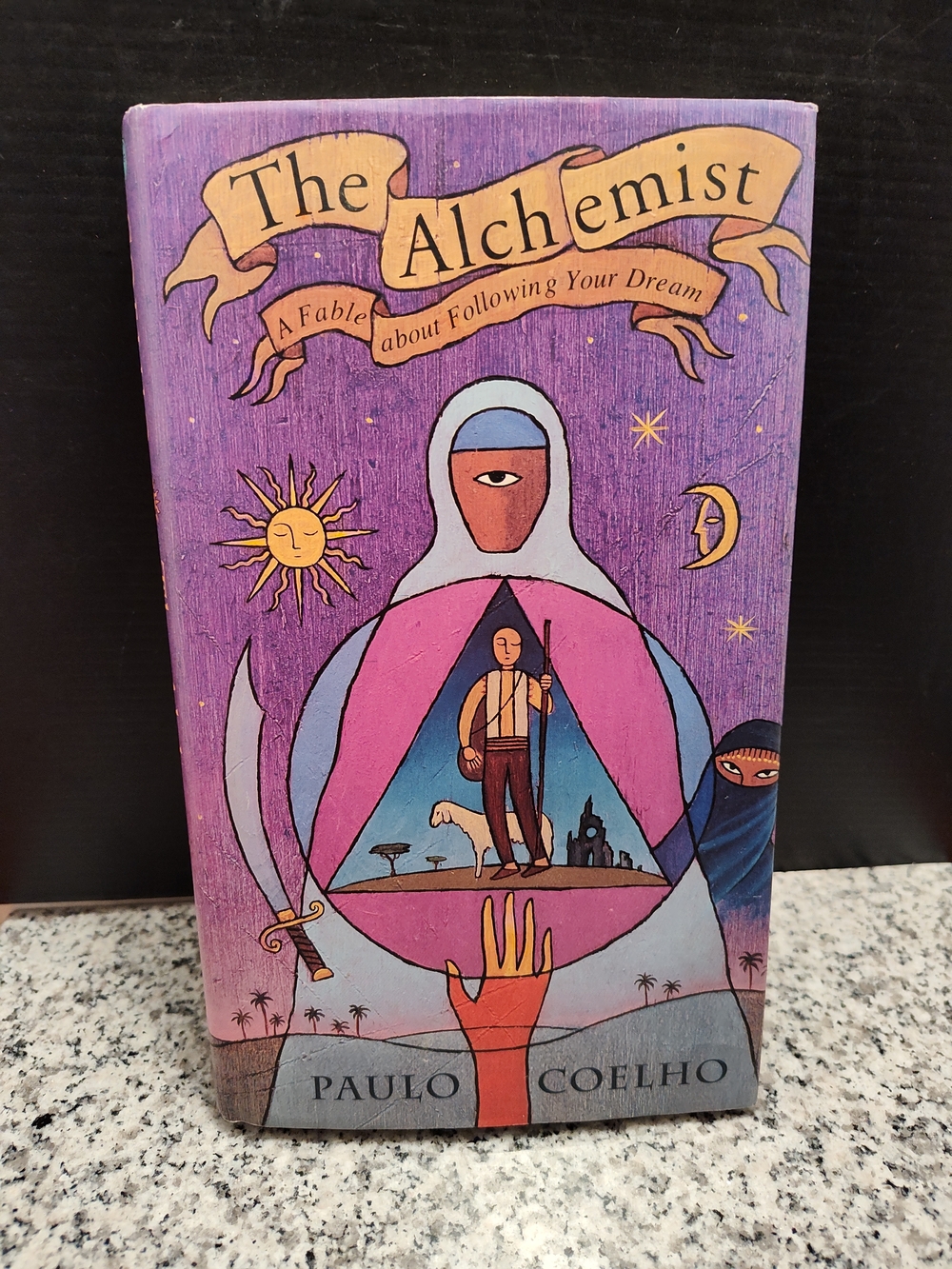 The Alchemist by Paulo Coelho - Purple Hardcover